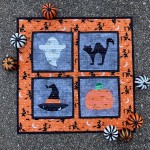 Strippy Improv Halloween  Square quilt by Lisa Ruble
